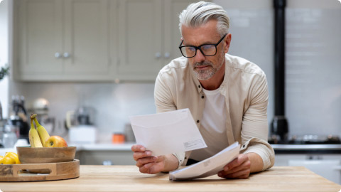 man reading mail